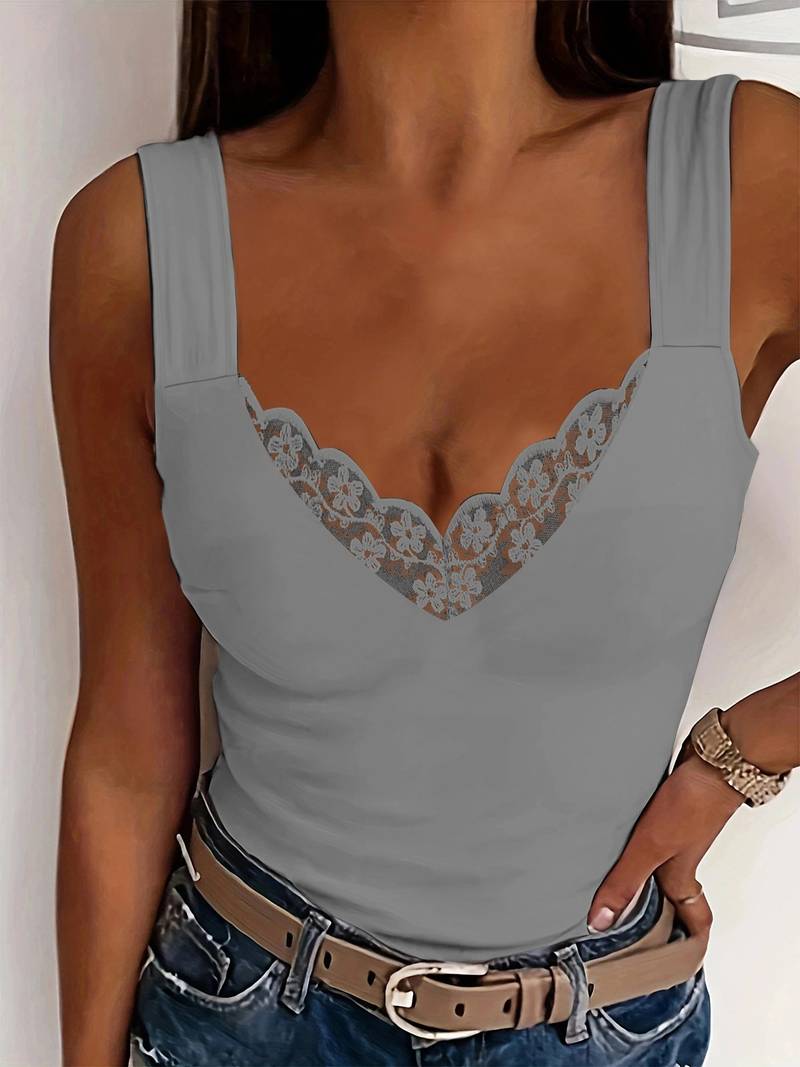 Women's flattering white lace trim tank top, an elegant and comfortable sleeveless summer essential.