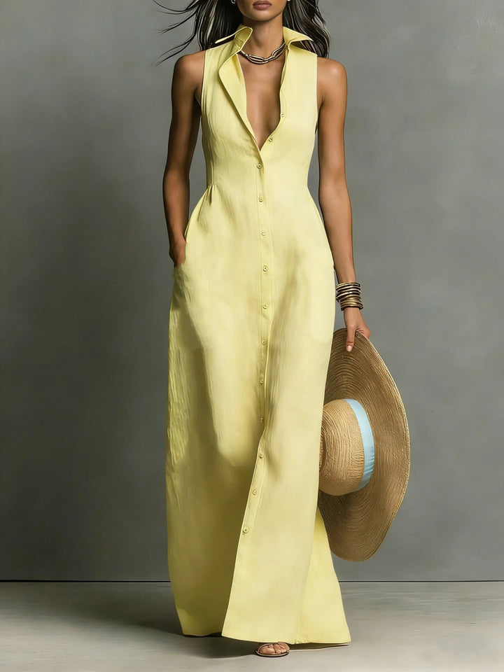 Flowing women's elegant lapel maxi shirt dress. Comfortable button-front design for versatile summer fashion.
