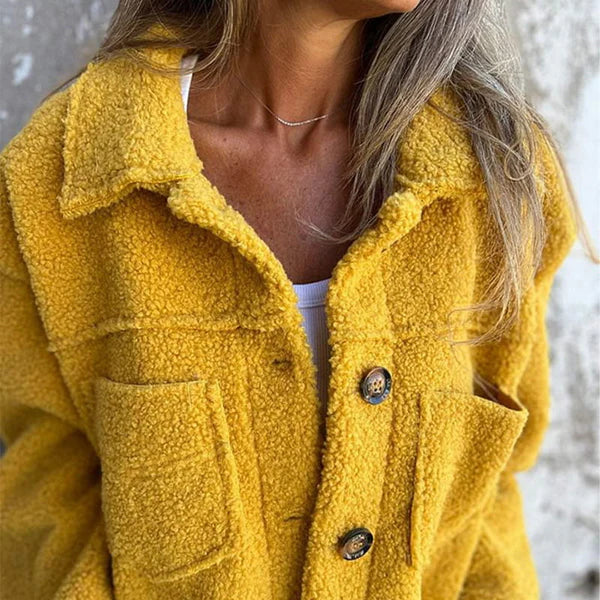 Chic women's lapel collar jacket. Comfortable fall outerwear with a stylish button-front design for versatile wear.