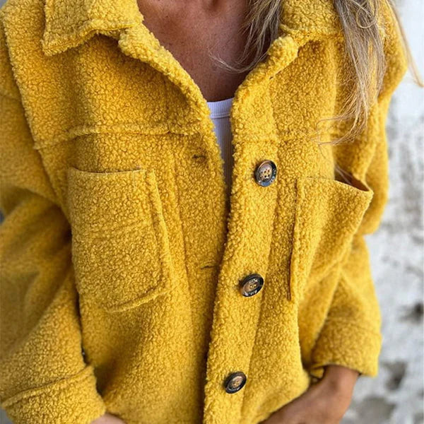 Versatile women's lapel collar jacket. Chic fall outerwear for elegant or casual wear, featuring a comfy button-front.