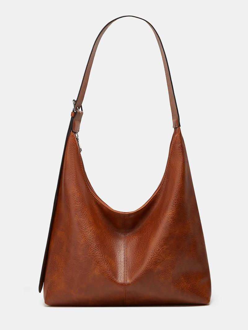 Elegant women's laptop tote bag, perfect for work. Features secure compartment for laptop, stylish design.