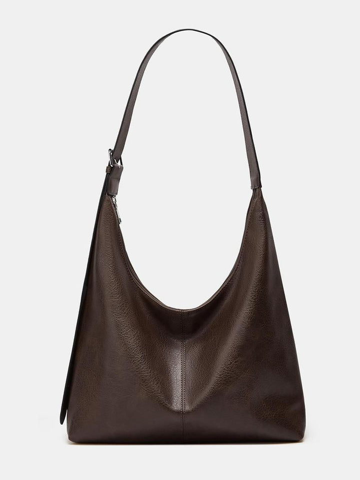 Professional women's shoulder laptop bag for office, business & travel. Stylish, spacious & secure tote.