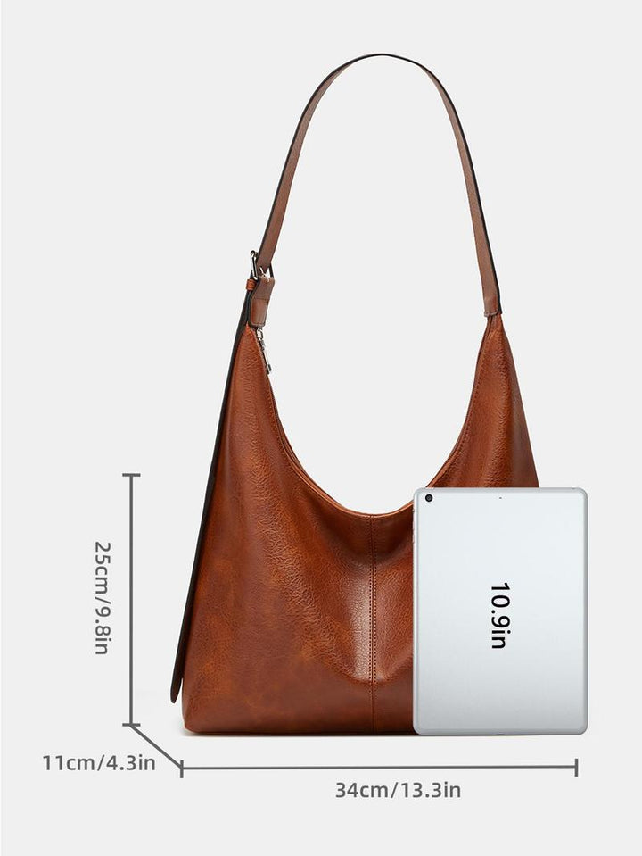 Spacious women's elegant laptop tote bag. Designed for business, work, & everyday use. Secure & fashionable.