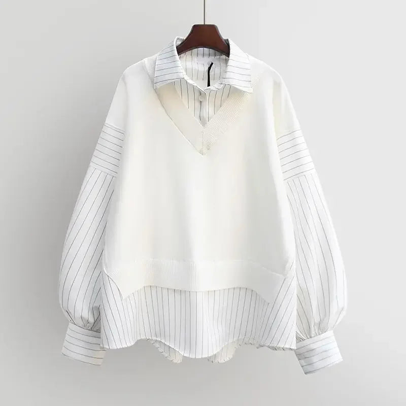 Black elegant layered blouse, a chic fashion statement top for women.
