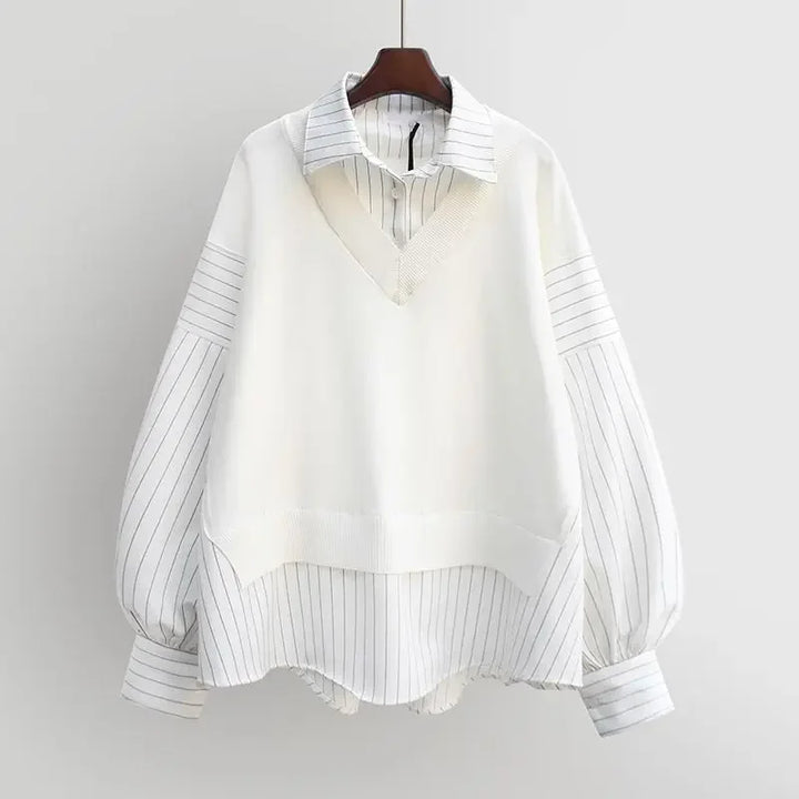 Black elegant layered blouse, a chic fashion statement top for women.
