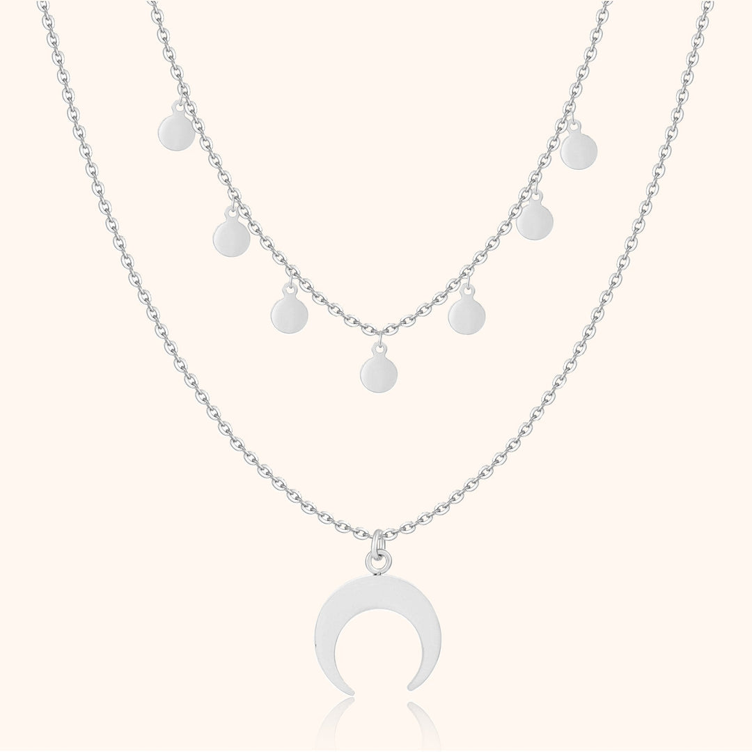Delicate gold-plated sterling silver double necklace with a chic crescent moon charm for women. Elegant layered jewelry.