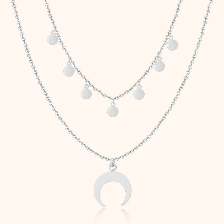 Delicate gold-plated sterling silver double necklace with a chic crescent moon charm for women. Elegant layered jewelry.