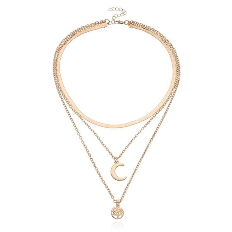 Chic women's layered necklace featuring a Tree of Life and Half Moon design. Elegant celestial jewelry.