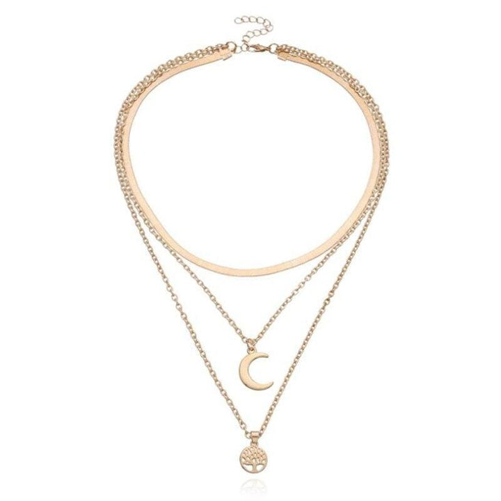 Chic women's layered necklace featuring a Tree of Life and Half Moon design. Elegant celestial jewelry.