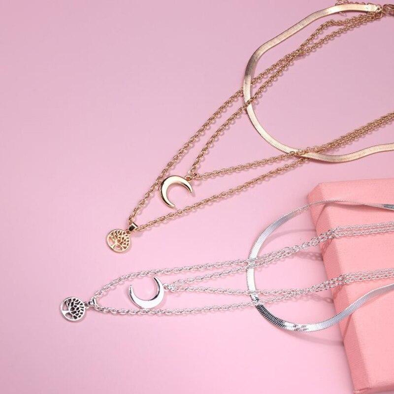 Symbolic women's layered Tree of Life & Half Moon necklace. Elegant celestial jewelry pendant for women.