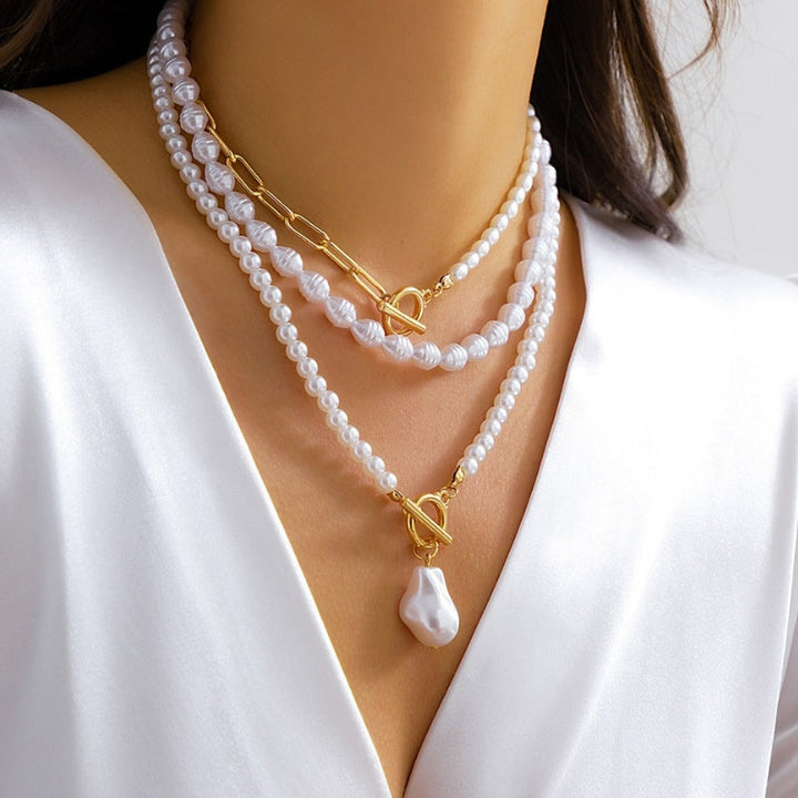 Sophisticated women's layered pearl necklace featuring a stylish toggle clasp, ideal for elegant fashion.