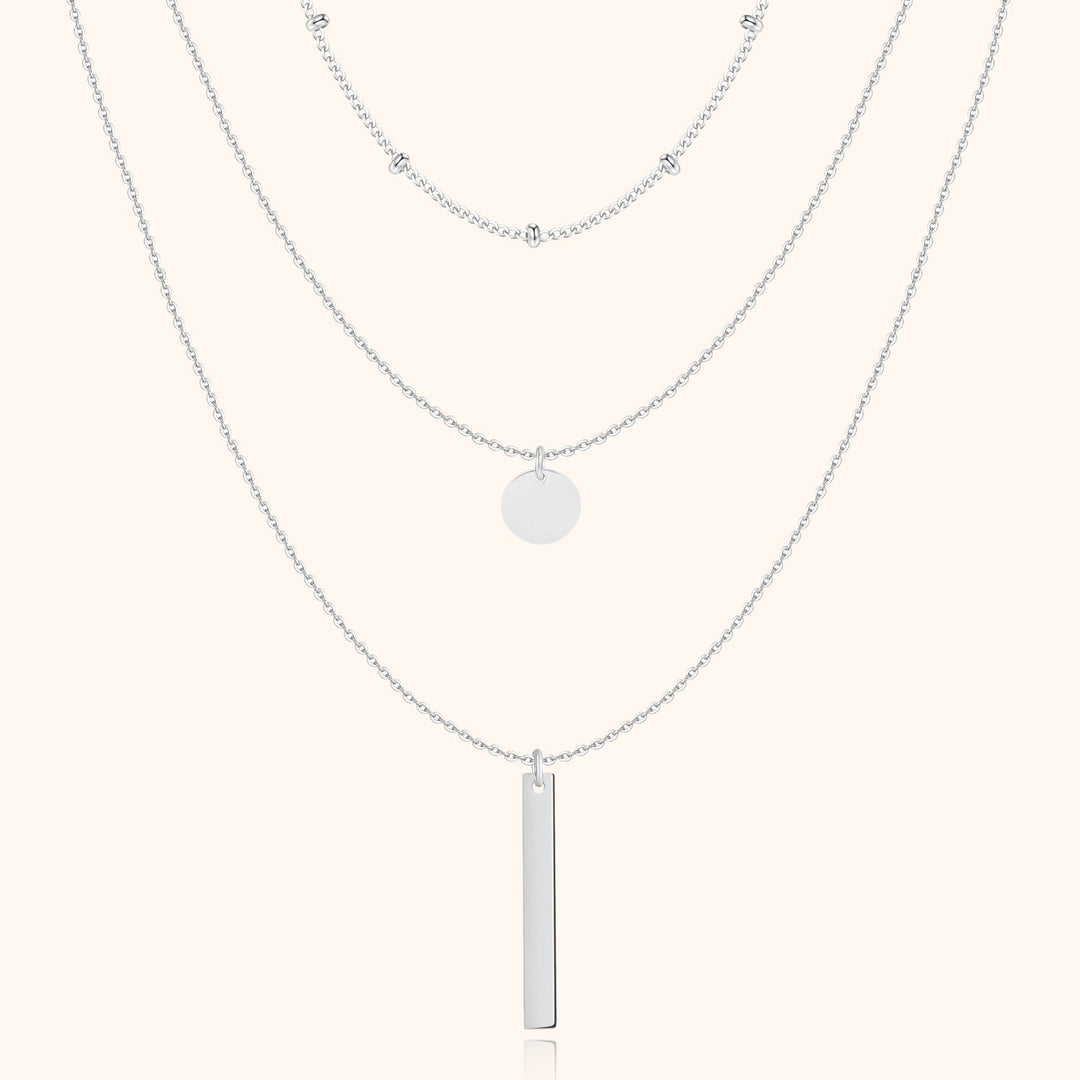 Delicate gold-plated triple layered chain necklace for women, perfect for elegant fashion jewelry.