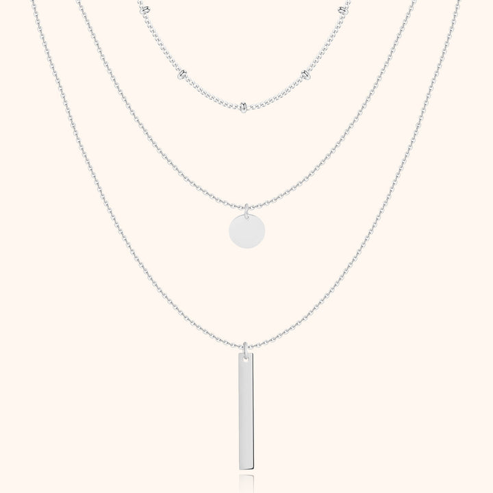 Delicate gold-plated triple layered chain necklace for women, perfect for elegant fashion jewelry.