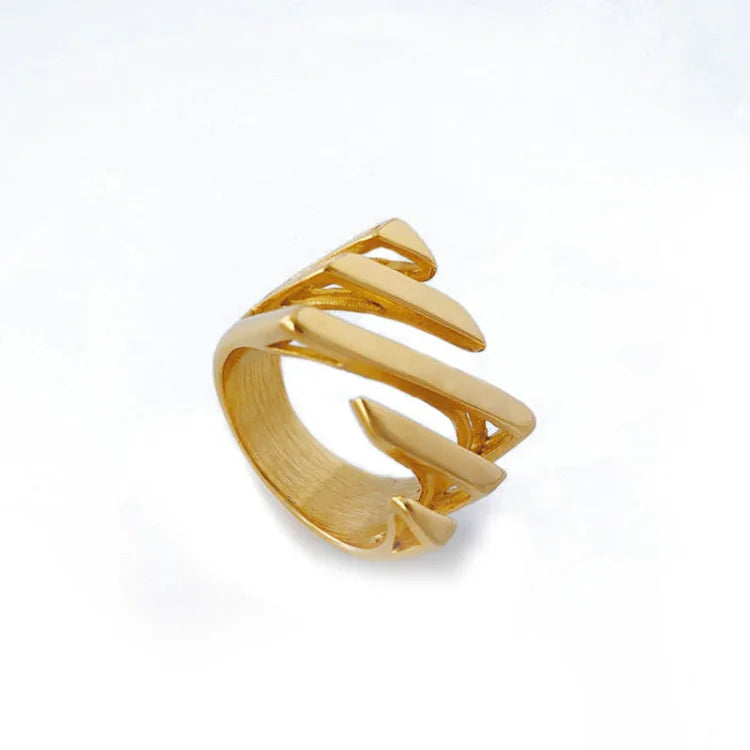 Elegant women's layered twisted ring with gold & silver plating, a modern fashion jewelry statement piece.