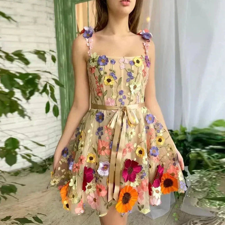 Lilac floral embroidered strap dress for women. Ideal elegant cocktail, party, or wedding guest attire.