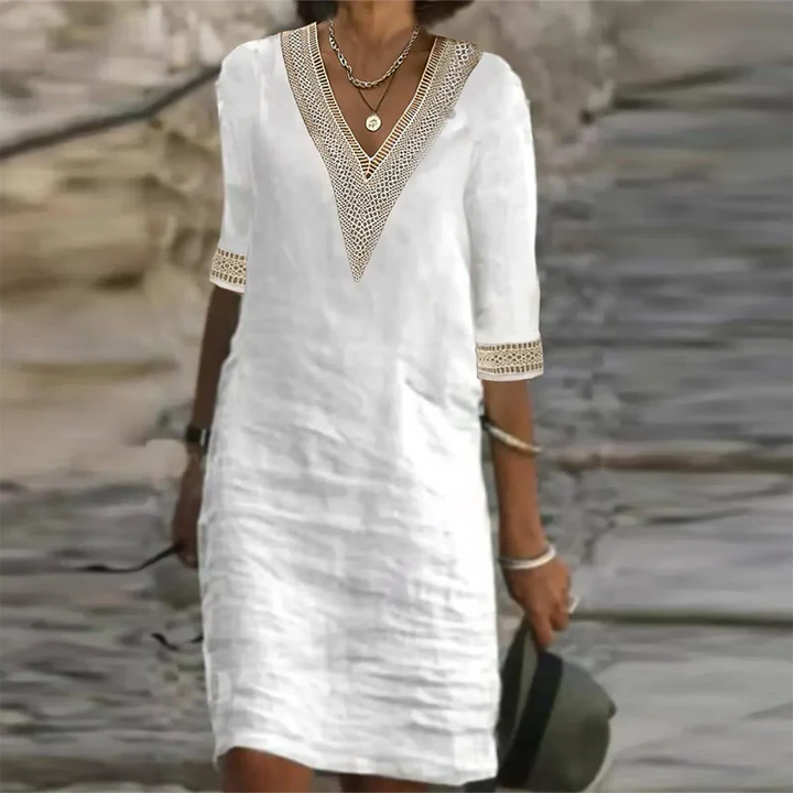 Elegant women's linen summer midi dress, comfortable & stylish for casual wear or vacation.