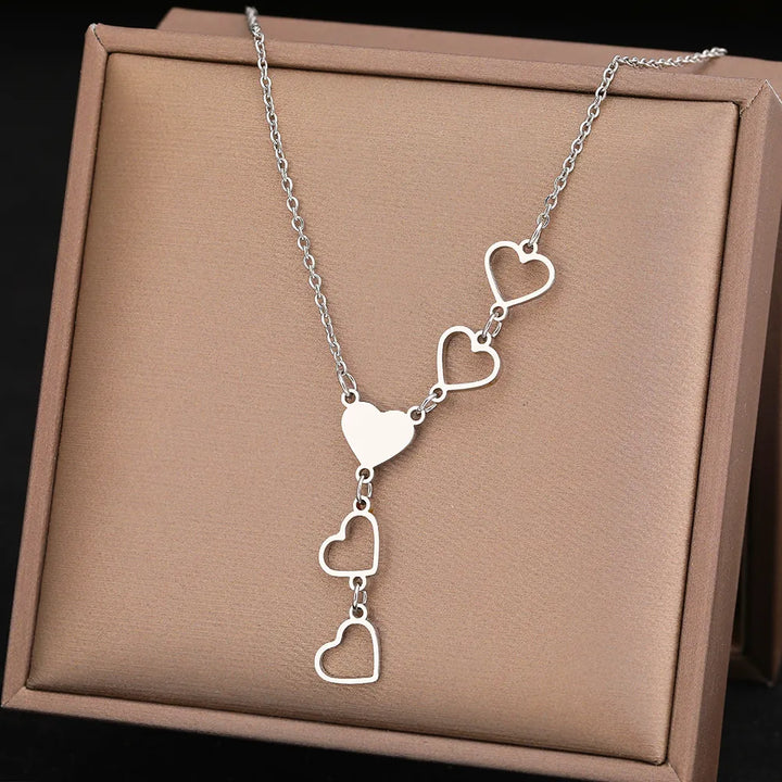 Gold & silver linked heart necklace, a perfect elegant anniversary gift or timeless love symbol for women.