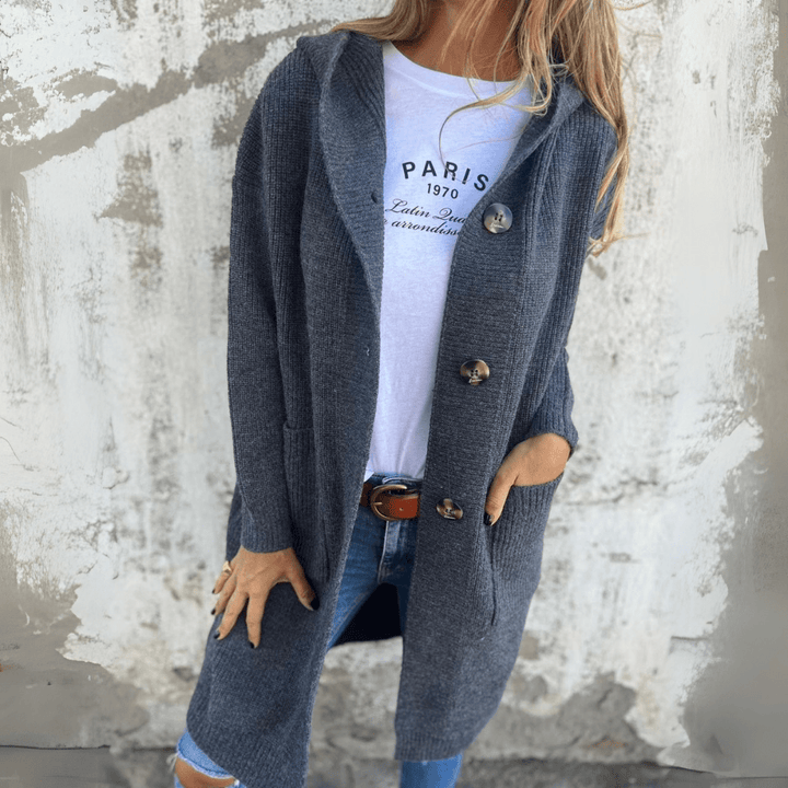 Graceful women's long cardigan showcasing its elegant drape. Versatile open-front design, great for fall & winter.