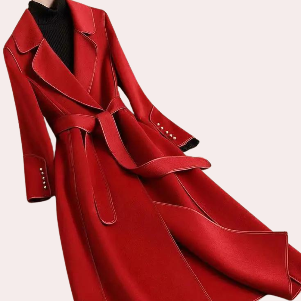 Stylish women's long fall coat with a flattering belted waist. Features elegant double-button closure for outerwear.