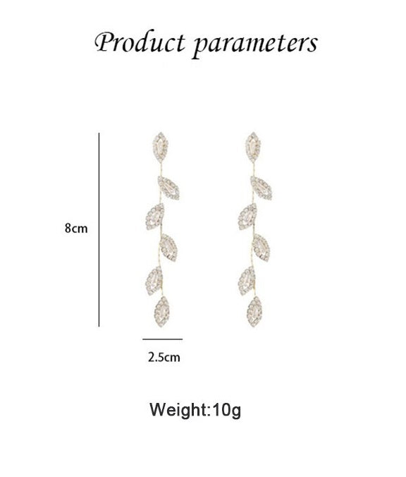 Women's elegant long dangle earrings, gold-plated with delicate golden leaf design. A chic and fashion accessory.