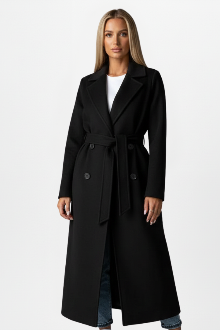 Refined women's long belted coat, double-breasted with notch collar. Perfect elegant workwear & sophisticated style.