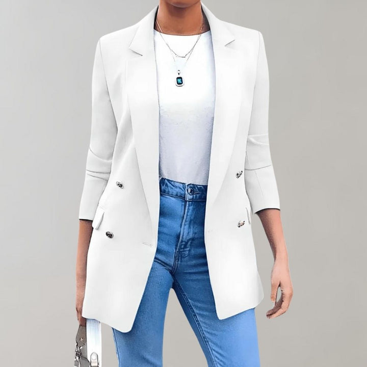 Fashionable women's long jacket, Clara, an essential versatile seasonal coat for elegant ladies.