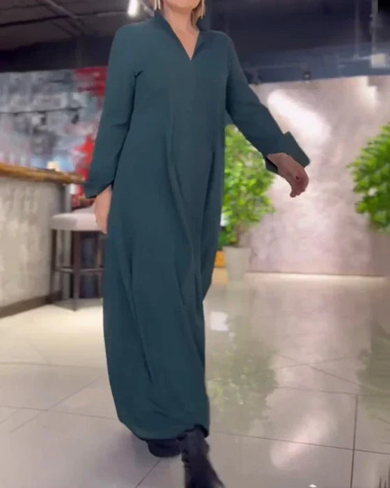 Women's casual chic long dress, Noémie style, featuring a loose fit, elegant side slit, and asymmetrical neckline.