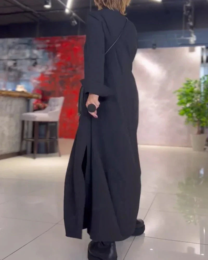 Flowy women's loose fit maxi dress with a sophisticated side slit and modern asymmetrical neckline for comfort.
