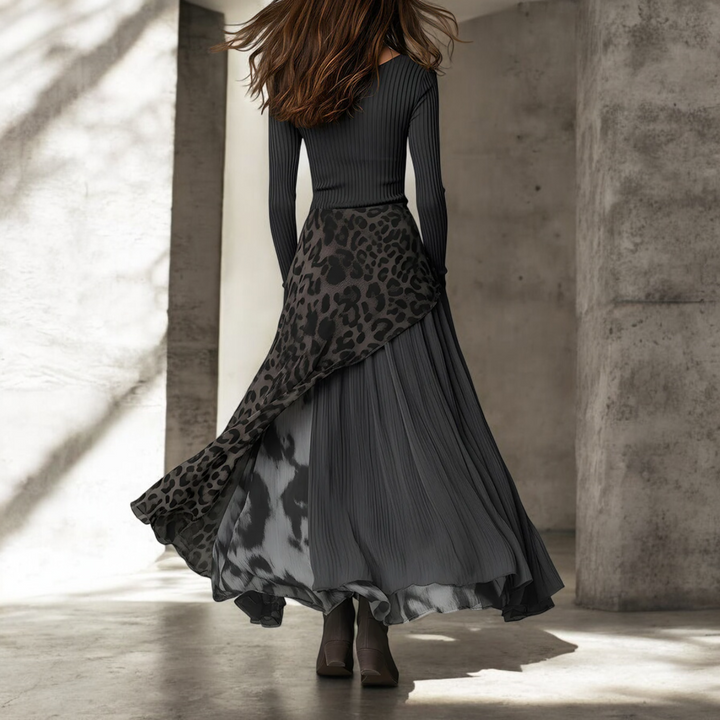 Fashionable women's elegant long dress, boasting chic leopard print. A versatile addition to any wardrobe.
