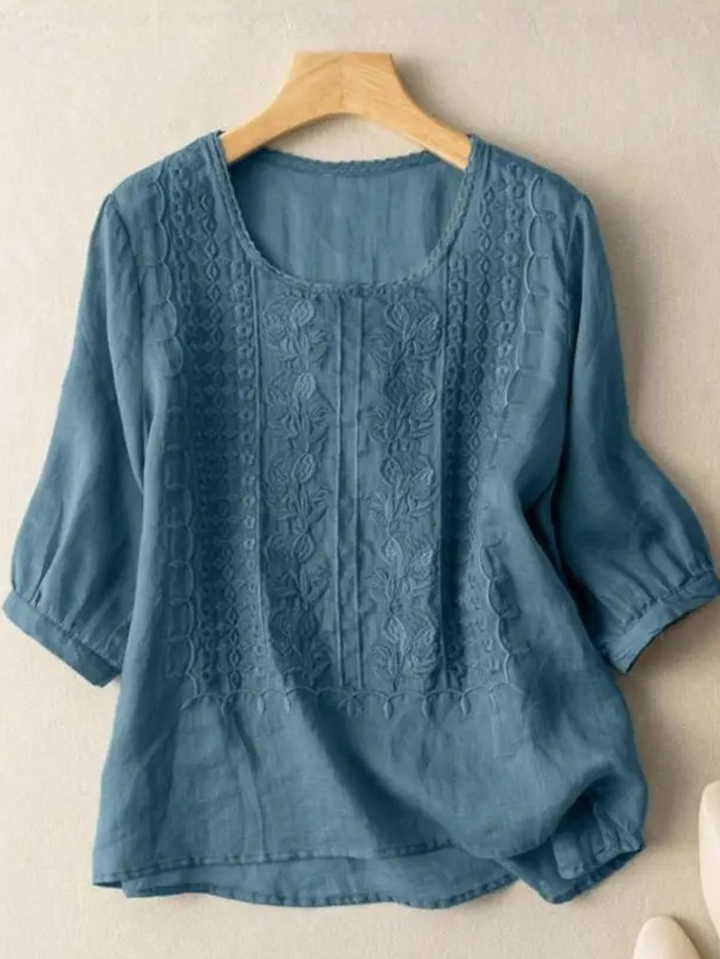Comfortable women's relaxed fit blouse, elegantly embroidered. Stylish long sleeve top, perfect for everyday wear.