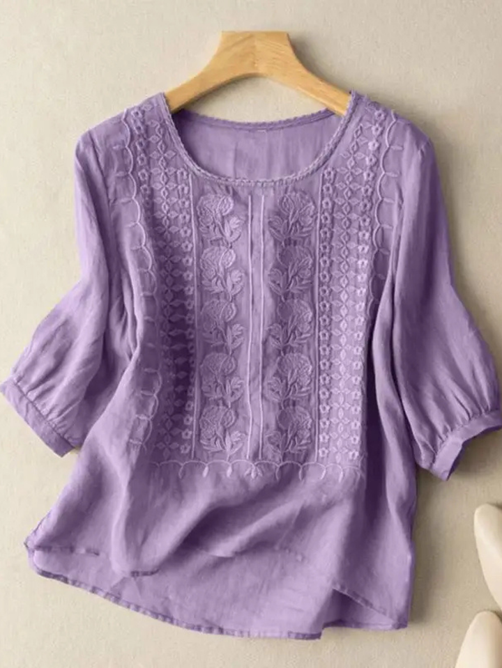 Women's elegant embroidered relaxed fit blouse. Comfortable long sleeve top, ideal for stylish everyday wear.
