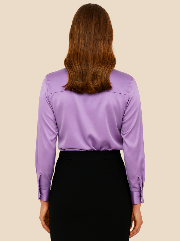 Chic women's work blouse with long sleeves & classic buttons, highly versatile.