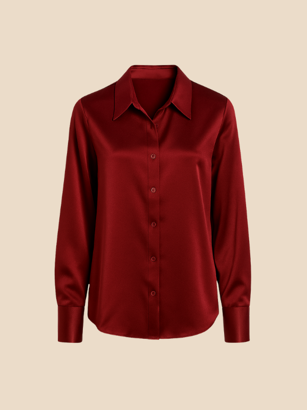 Stylish women's buttoned long sleeve top, perfect for a refined office look.