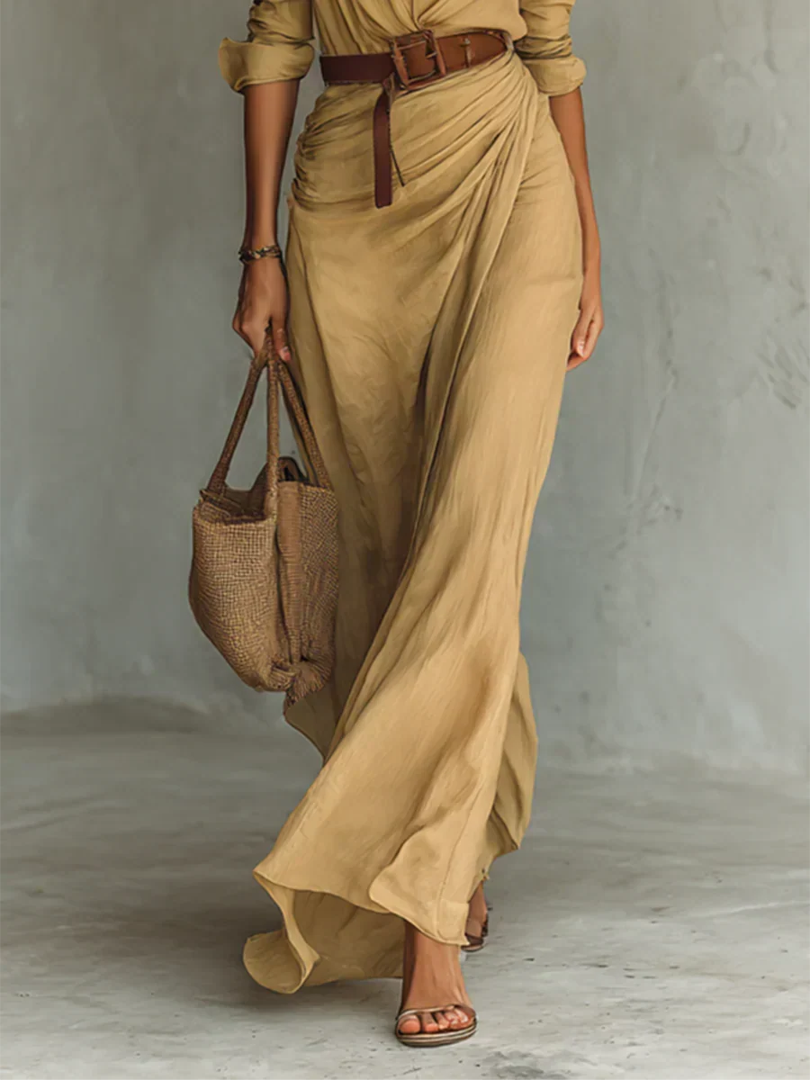 Black women's long sleeve belted maxi dress with lapel, a versatile and elegant piece for casual or formal wear.