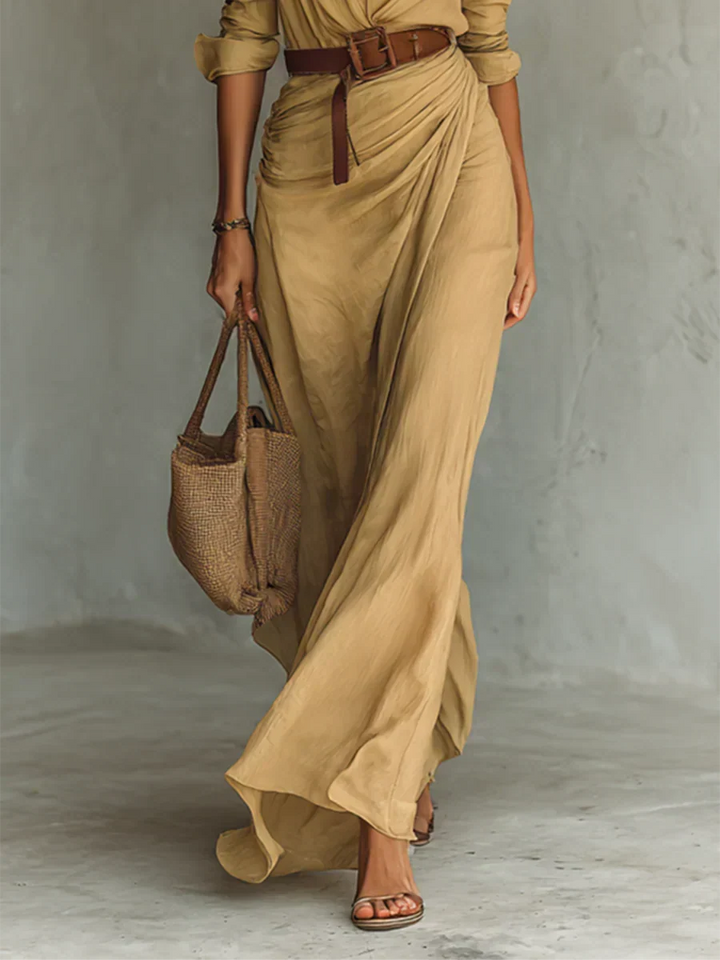 Black women's long sleeve belted maxi dress with lapel, a versatile and elegant piece for casual or formal wear.