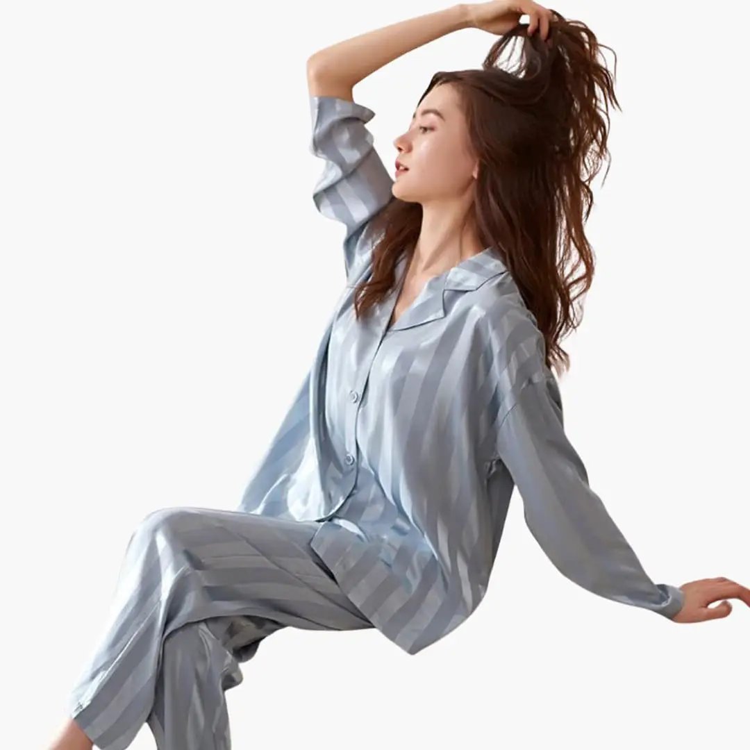 Comfortable women's two-piece long sleeve pajama set. Elegant lounge wear, relaxed fit for ultimate sleepwear comfort.
