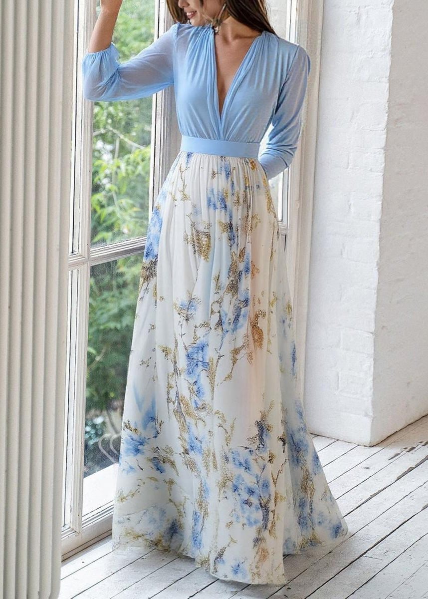 Stylish women's long-sleeve V-neck maxi dress, featuring a vibrant floral print, suitable for women's fashion.