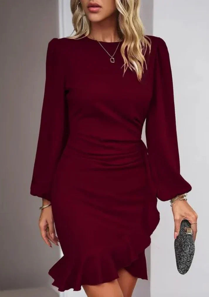 Fashionable women's long sleeve midi dress. An elegant, classic piece for any occasion. Modern apparel.