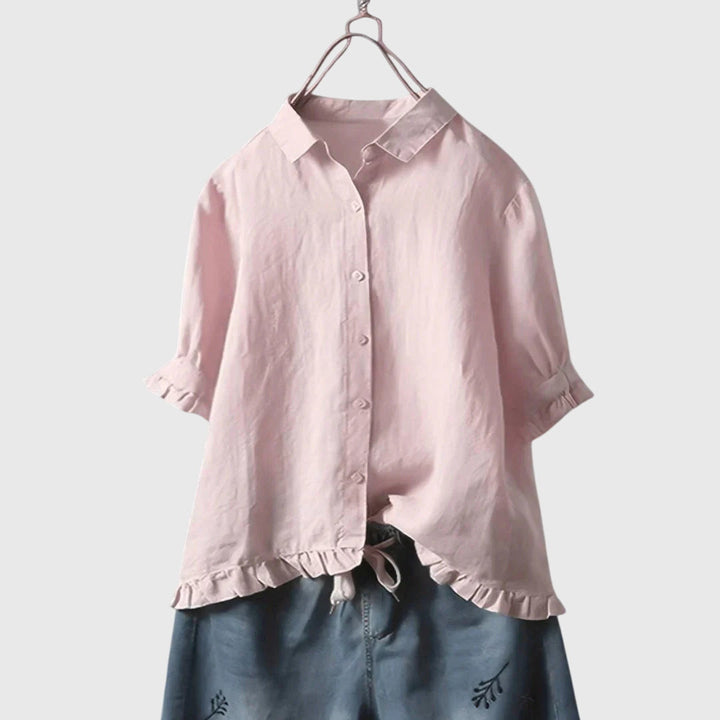Chic women's long sleeve blouse with an elegant design, suitable for everyday style or a sophisticated office outfit.