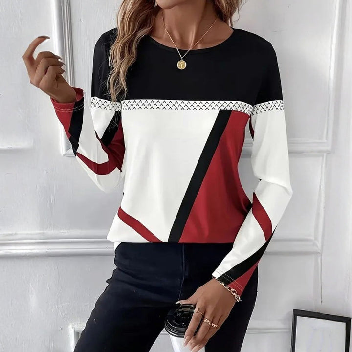 Elegant women's long sleeve tunic shirt for versatile all-season wear. Comfortable, chic & relaxed fit.