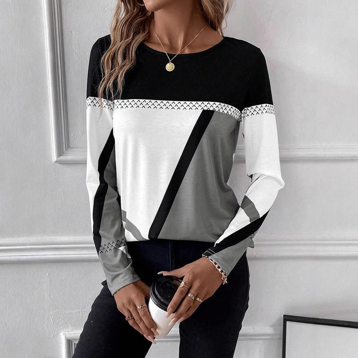 Versatile women's tunic shirt with long sleeves for winter layering or warm weather. Relaxed & elegant fit.