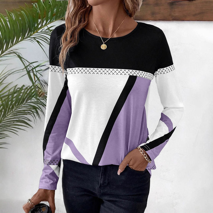 Soft women's long sleeve tunic top, offering a relaxed and chic silhouette for any casual occasion.