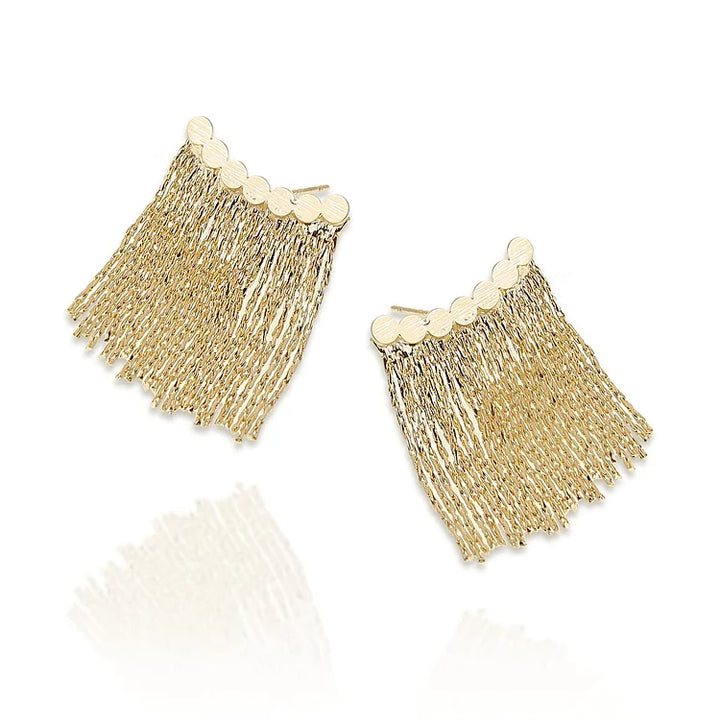 Elegant women's long tassel drop earrings, gold plated for a glamorous party or evening wear look.