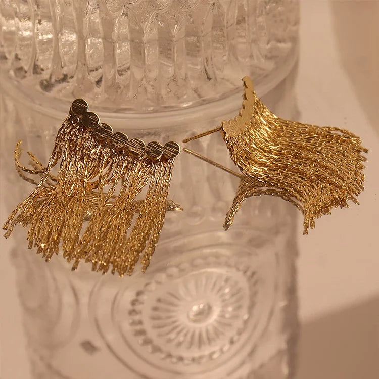 Fashionable women's long tassel drop earrings, silver plated jewelry for elegant and glamorous evening wear.