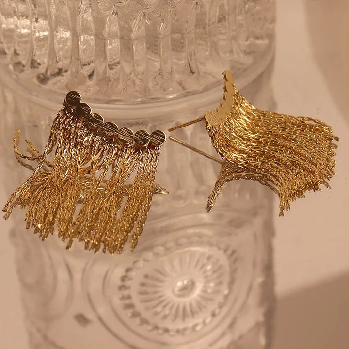 Fashionable women's long tassel drop earrings, silver plated jewelry for elegant and glamorous evening wear.