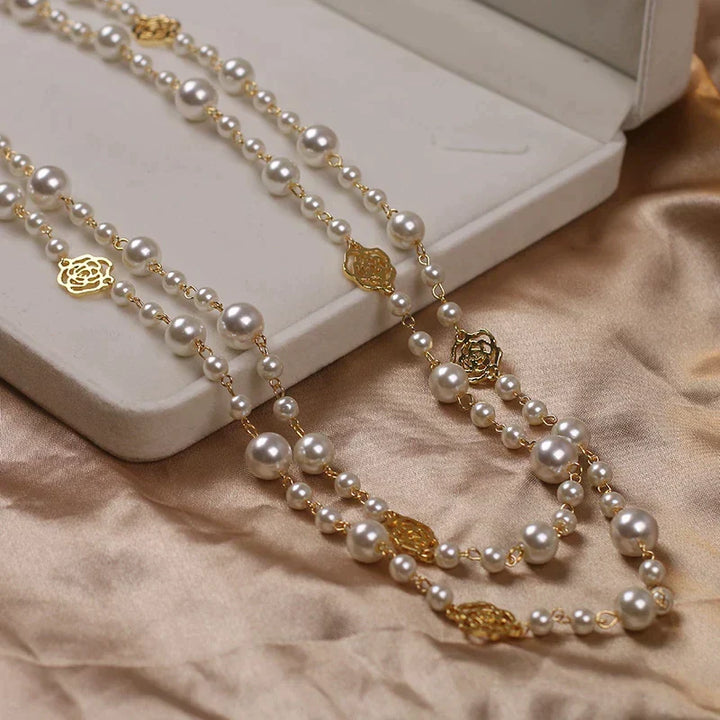 Elegant women's long white pearl necklace, perfect for a timeless look.