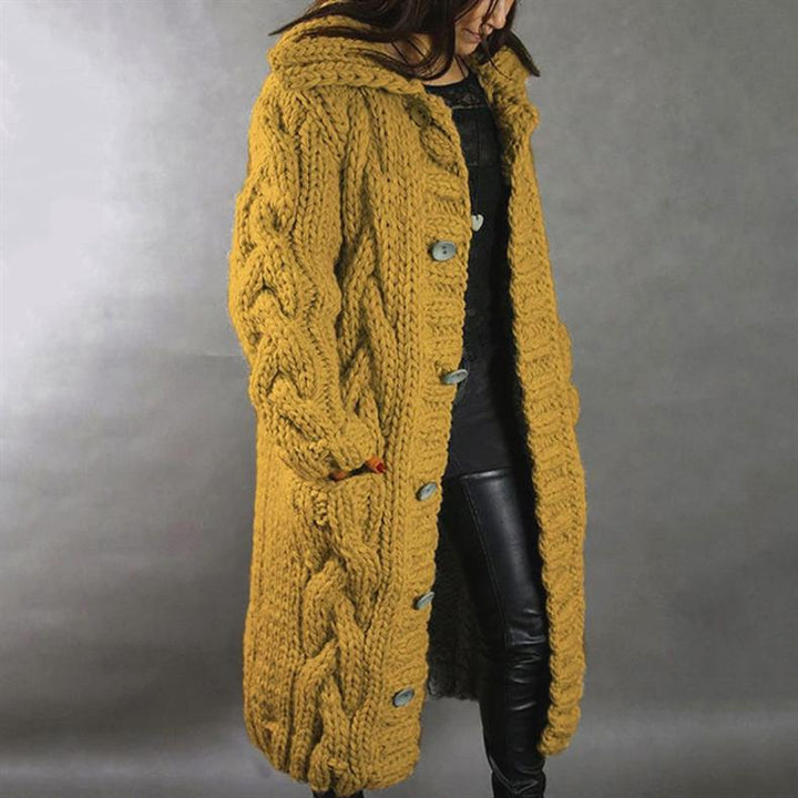 Cozy & warm women's pink long winter coat. Elegant outerwear for chilly days, offering both style and comfort.