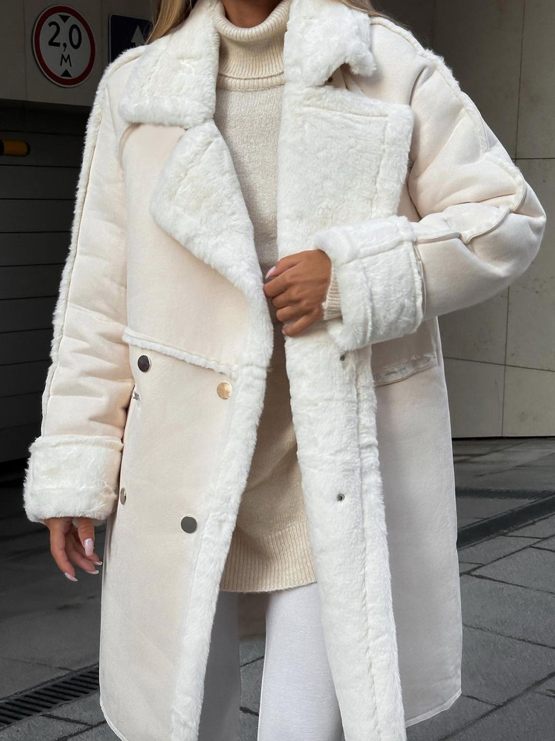 Stylish long polar fleece women's winter coat, Ava model. Warm, elegant outerwear for cold weather.