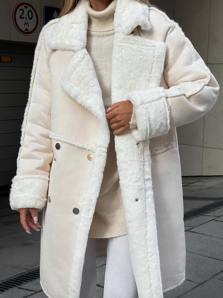 Stylish long polar fleece women's winter coat, Ava model. Warm, elegant outerwear for cold weather.