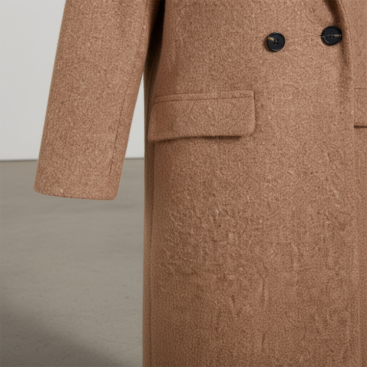Warm women's long wool blend winter coat with elegant button closure, ideal for colder weather